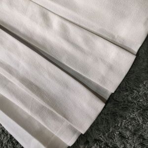 Knee Length White Pleated Skirt