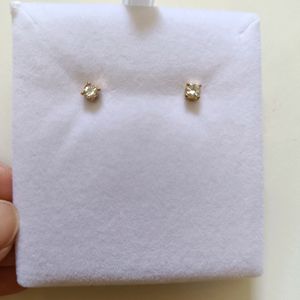 9 Pairs Of Dainty Studs By Colette