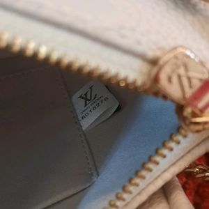 LOUIS VUITTON SLING BAG