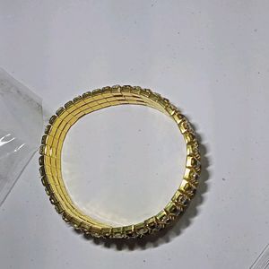 Stone Fitted Golden Bracelet