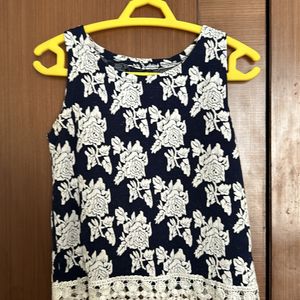 Sleeveless Top With Hanging Design