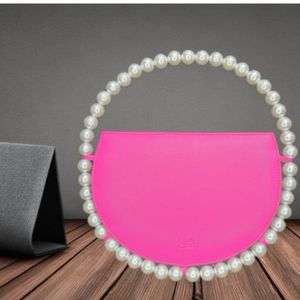 Circular Pearl Handle Sling Bag