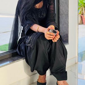 A Black Punjabi Suit