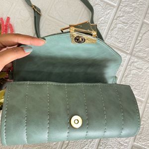 Green Roll shaped sling bag