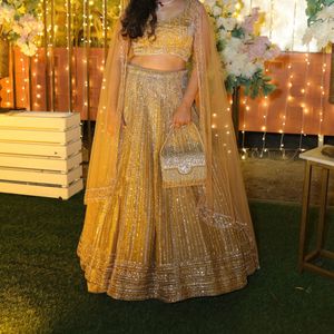 embellish golden lehnga