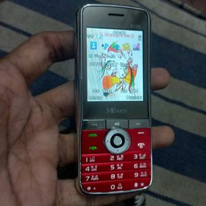 Moses E100 With Free 2 Gb Sd Card Earphones Chager