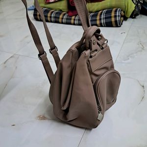 Two Way Beige Purse And Bagpack