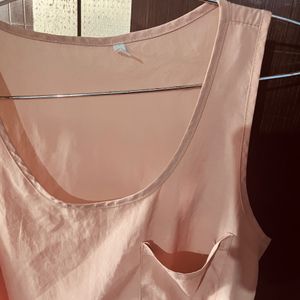 A Peach Colour Top.  Size:M.