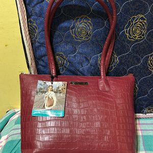 Caprese Maroon Handbag