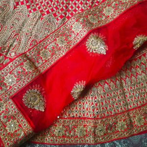 Unstiched Red And Gold Lehenga