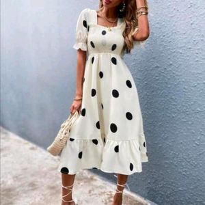 White Knee Length Dress With Black Polka Dots