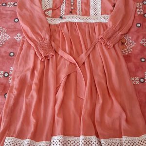 A Beautiful Peach Colour Frok Suit