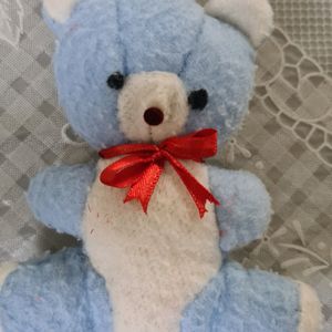 Sky Blue Teddy Bear with Red bow...a Stuffed Toy