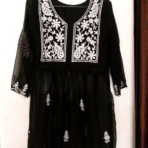 A Short Chikankari Kurti In Black Colour