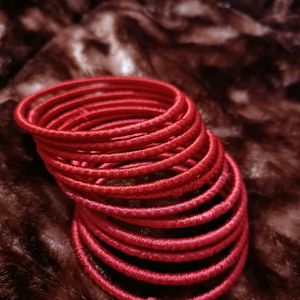 hand made silk thread  bangles. Colour - bright re