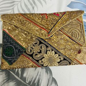 Beautiful Traditional Looking Clutch With Sling Belt