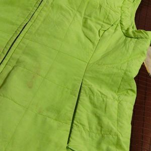 Fluorescent green puffer jacket