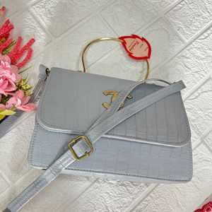 Grey croco pattern handbag/slingbag