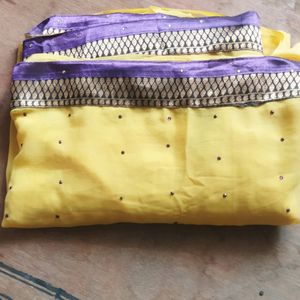 Yellow Saree With Purple Border