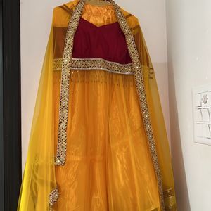 Yellow Lehenga With Beautiful Red Blouse