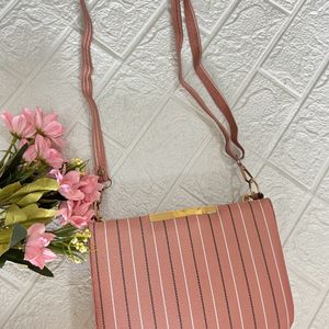 Peach stripped box sling bag