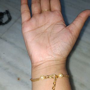 Golden Hathful Ring Cum Bracelet