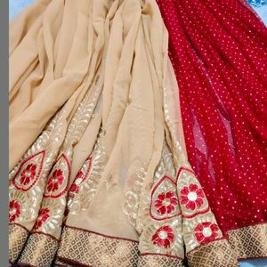 Beautiful Red And Golden Saree With Blouse Piece