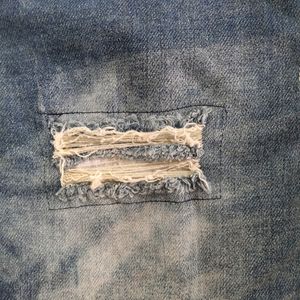 Women Ripped Faded Blue Jeans