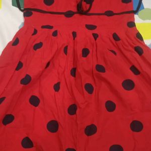 Girl Red Frock With Black Dots Used