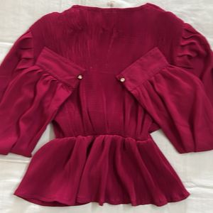 Pleated Peplum Top With Bow