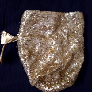 Golden sequined potli