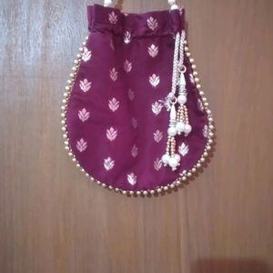 Kurta Skirt Set With Matching Potli