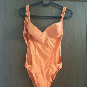 Pretty Padded Orange Trikini With Side Cuts
