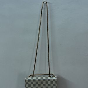 Checkered Beige And Black Sling Bag