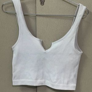 White sleeveless crop