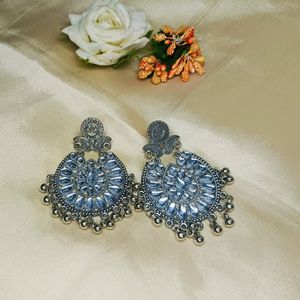 silver colour earrings