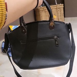 Sling Plus Handbag