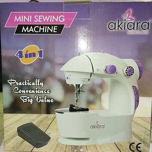 Brand new Akiara 4 in 1mini sewing machine with table