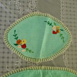 A Set of 3 hand embroidered table mats