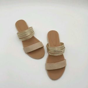 Tan And Gold Flat Sandals.