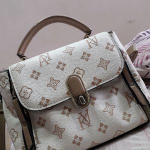 White And Cream Textured Sling Bag