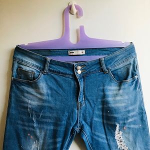 Flared Jeans With Patches