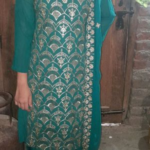 Sea Green Suit And Plazo With Less Dupatta.