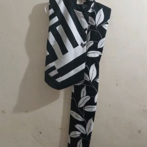 A Fashionable Black And White Blazer Cum Upperwear