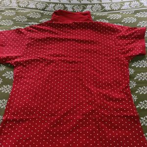 A Red Polo T Shirt For Women In Size XL.