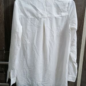 An Oversized White Shirt.