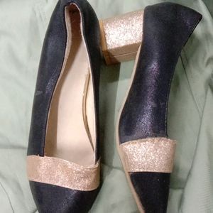 Heel With Gold and Black Colour