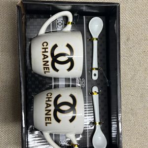 chanel tea cups with spoons