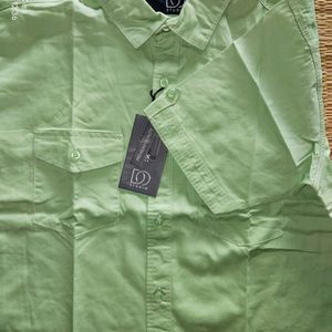 Premium cotton half shirt featuring two pockets.