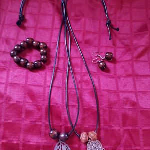 Oxidised pendants in long black thread